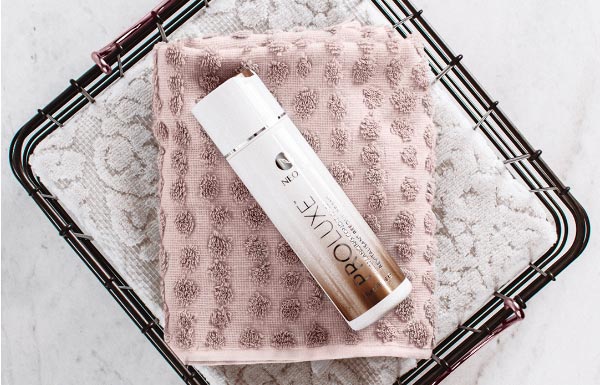 Image of ProLuxe Rebalancing Conditioner in clear cosmetic bag.